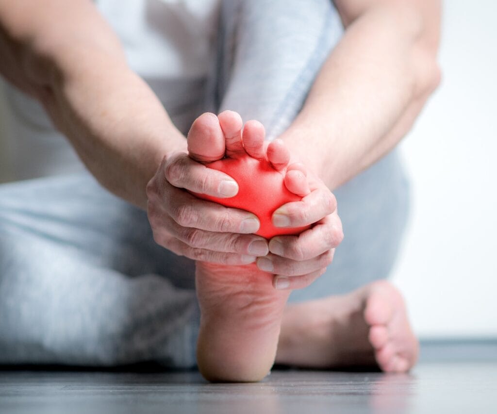 man with pain in foot